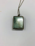 Sterling silver and butterfly wing pendant