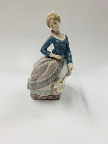 Lladro girl with a parasol