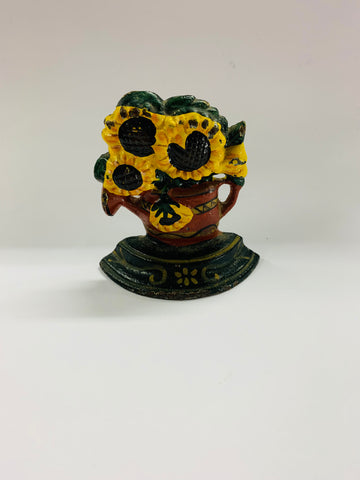 Small cast iron door stop