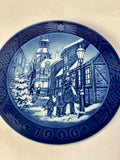 Royal Copenhagen Christmas Plate 1996 Lighting the Street Lights