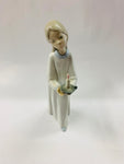 Lladro Girl holding a candle