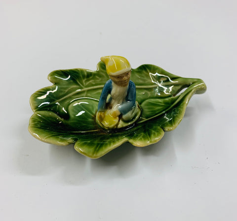 Wade Shamrock pottery pixie on a leaf