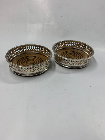 Pair of silver plated and wooden decanter coasters