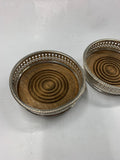 Pair of silver plated and wooden decanter coasters