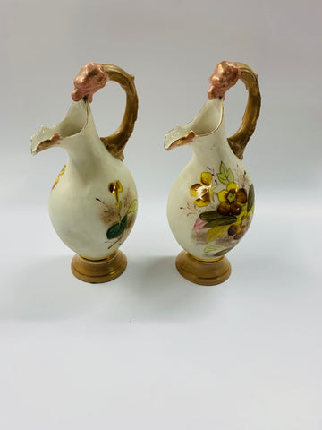 Pair of Victorian hand painted jugs with animal head handles