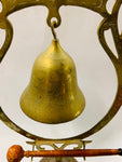 Large brass dinner gong bell with wooden hammer