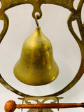 Large brass dinner gong bell with wooden hammer