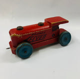 Antique wooden toy train with tin wheels