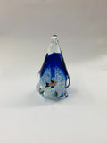Art glass penguin with a fish inside