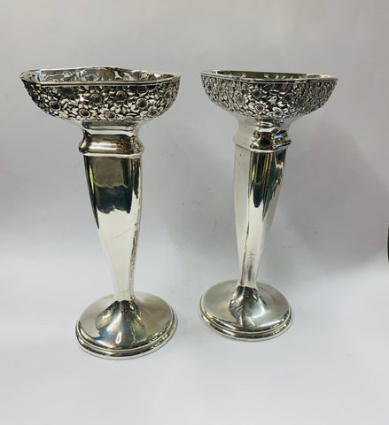Pair of ornate Silver plated vases