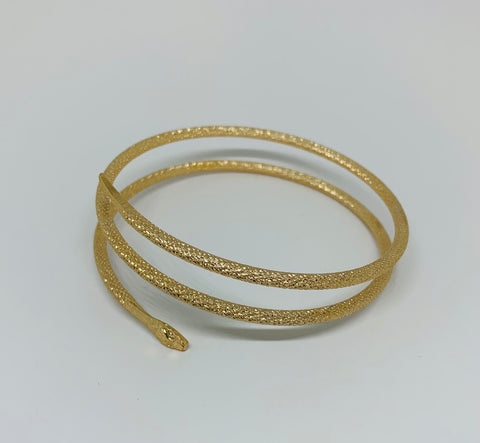 Gold tone metal snake bangle