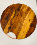 Large round wooden cheese board or serving platter