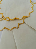 White round Napkins and Coasters with Yellow Edging