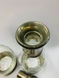 Pair of antique glass and pewter decanters