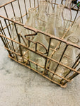 Vintage milk crate with 12 quart milk bottles